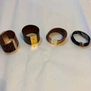 Set of Four Stylish Bracelets with Gold Accents